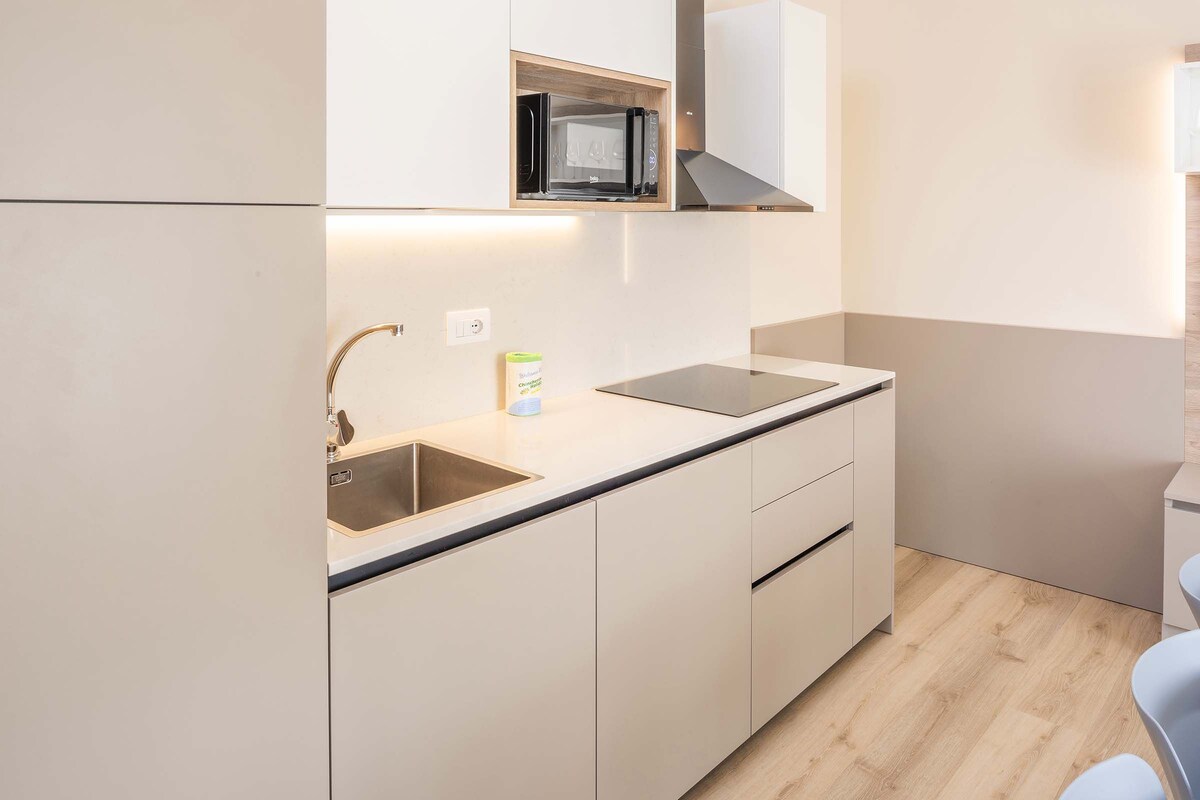 Mini-fridge, microwave, cookware/dishes/utensils