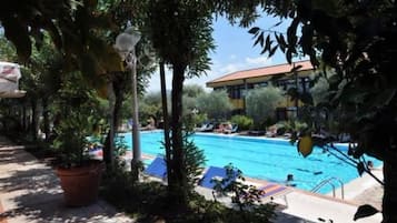 Seasonal outdoor pool, pool umbrellas, sun loungers