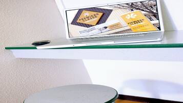 Desk, blackout curtains, free cots/infant beds, free WiFi