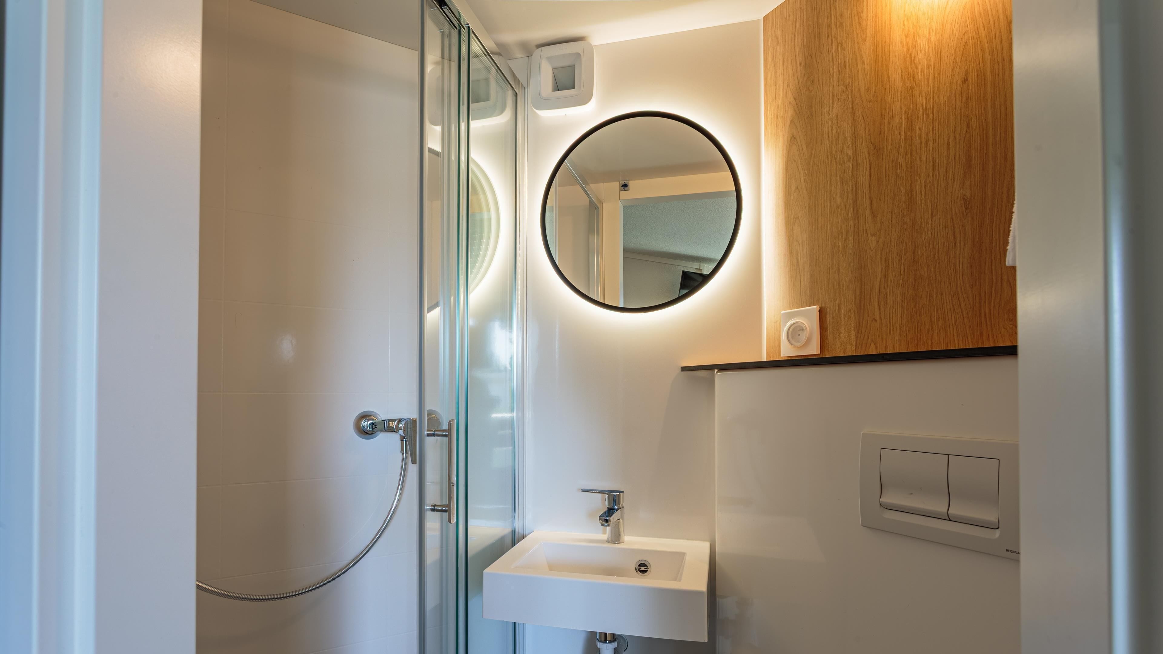 Shower, rainfall showerhead, eco-friendly toiletries, towels
