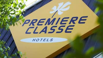 A sign for Premiere Classe Hotels.