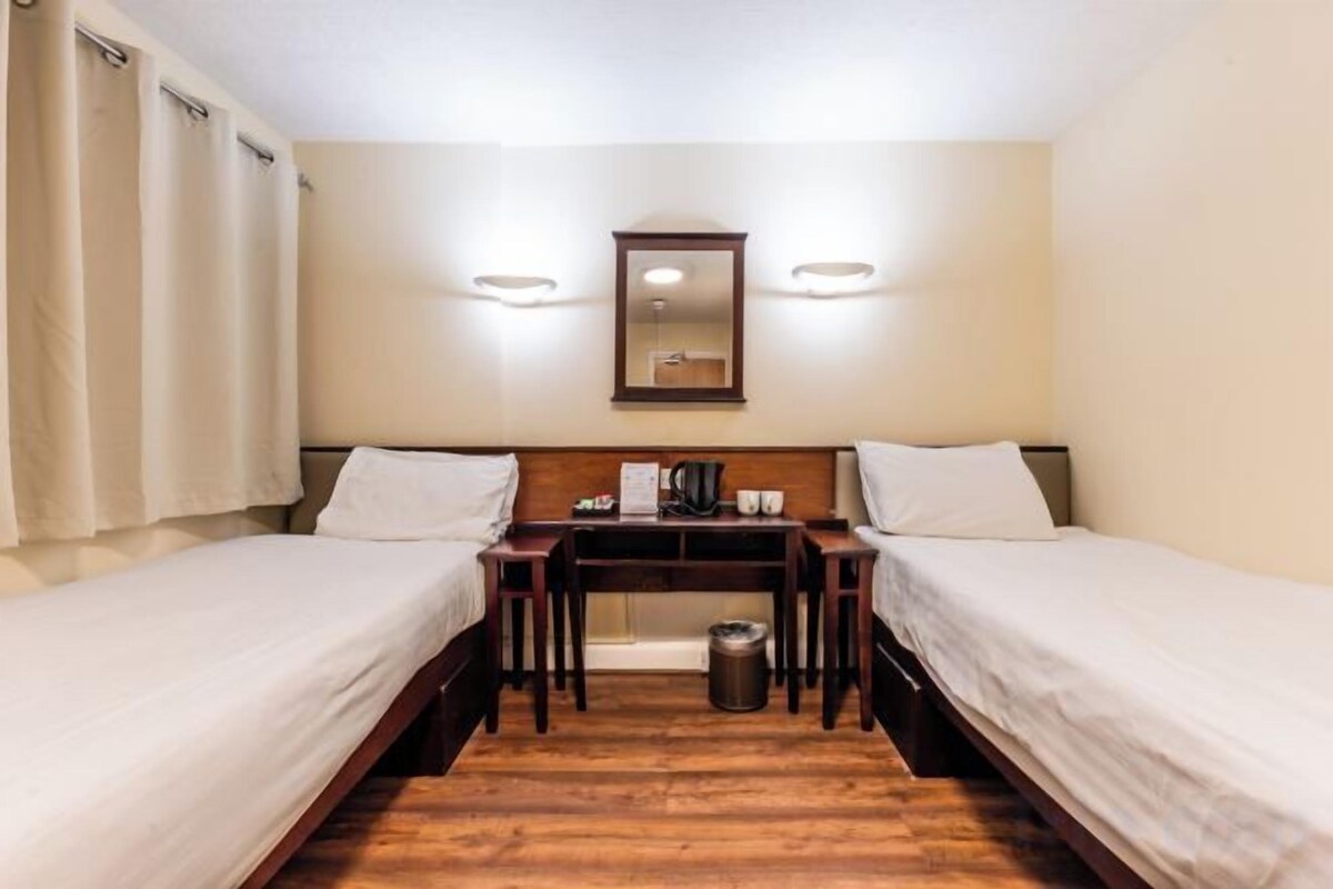 Desk, iron/ironing board, WiFi (free), bed sheets