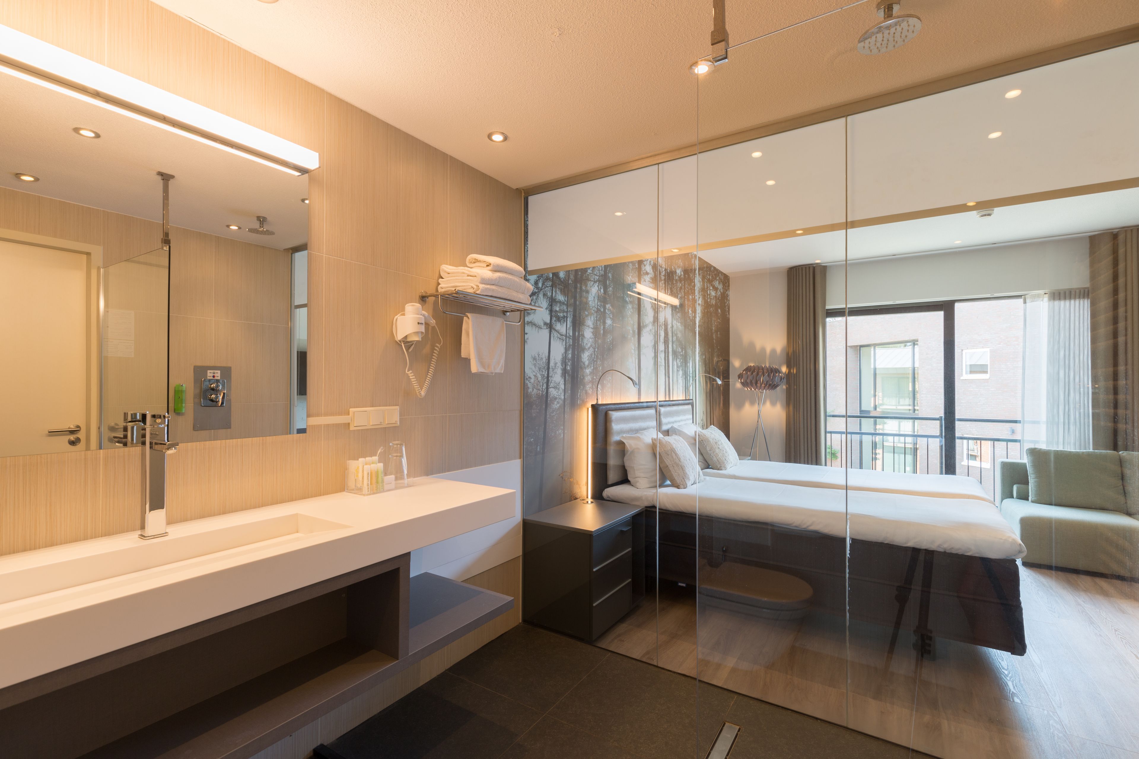 luxury room | bathroom | eco-friendly toiletries, hair dryer, towels