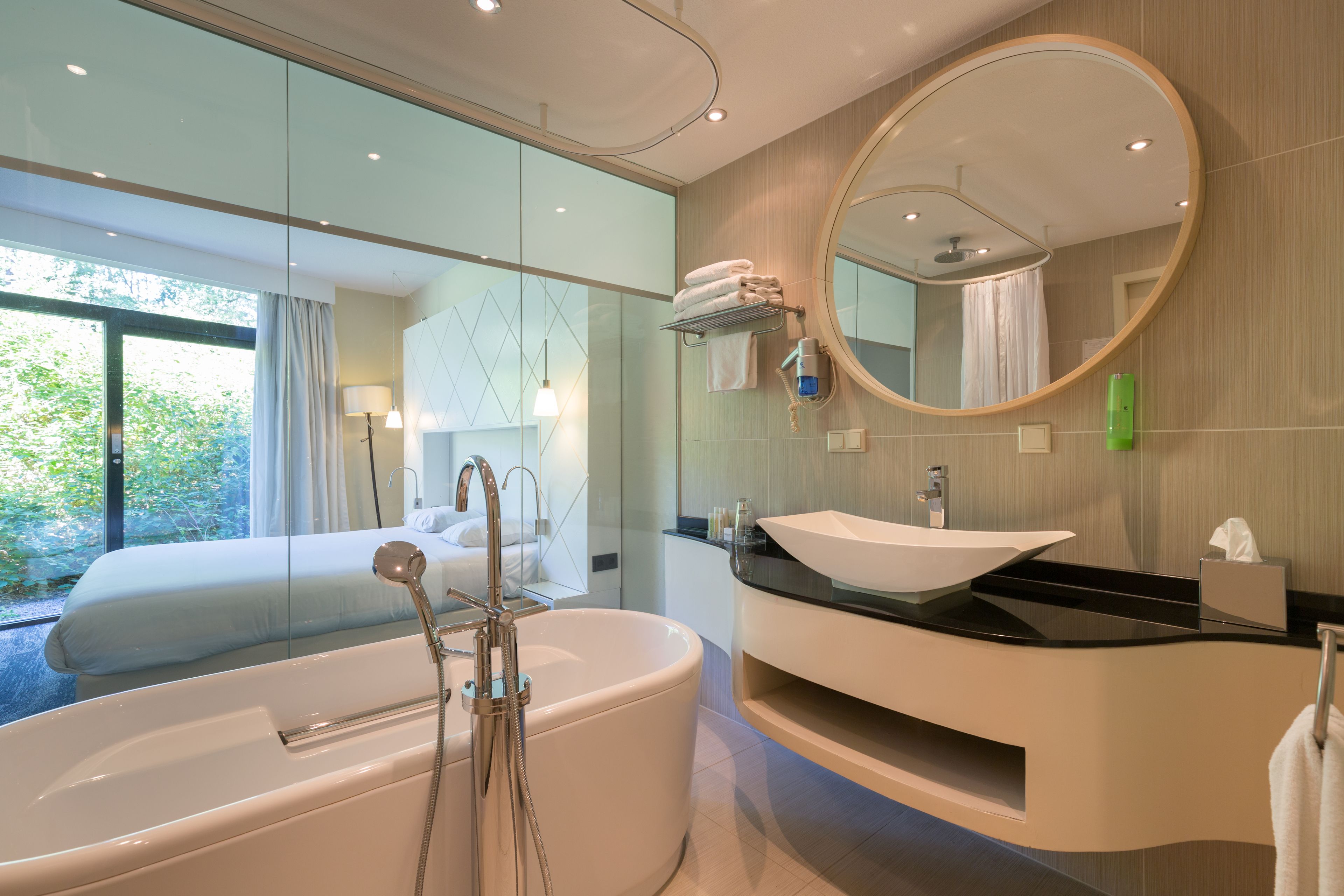 eco-friendly toiletries, hair dryer, towels