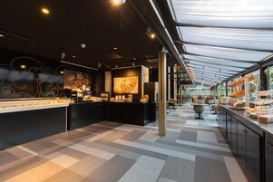 Breakfast, lunch, dinner served; international cuisine 