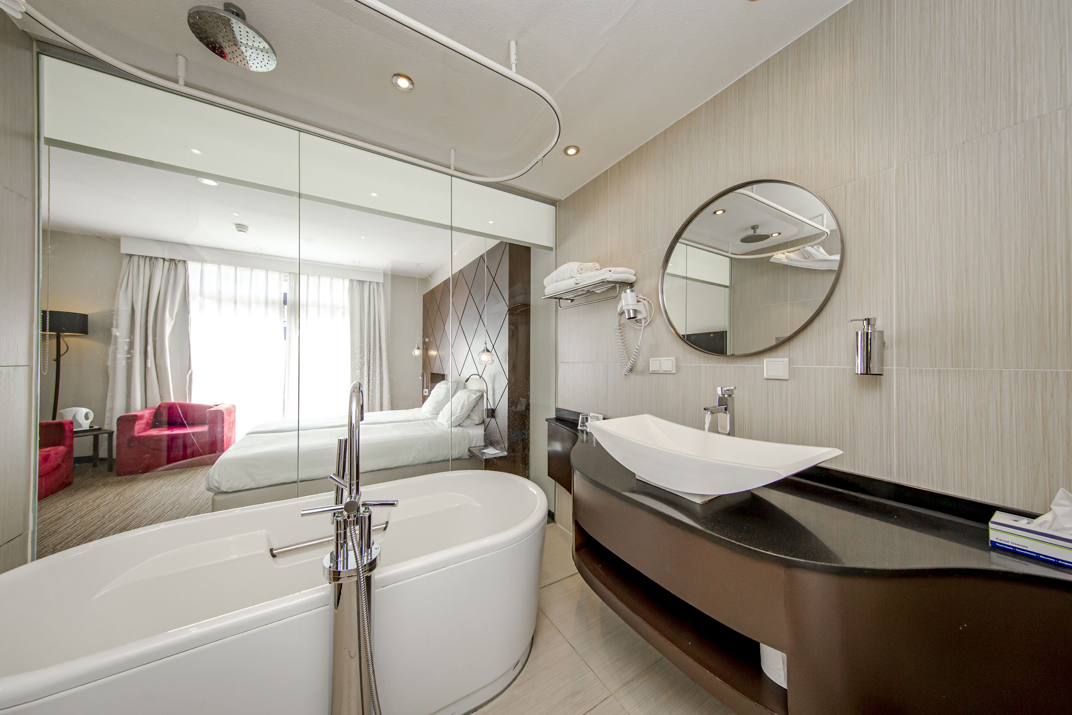 eco-friendly toiletries, hair dryer, towels