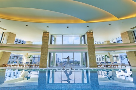 Indoor pool, open 6:30 AM to 10:00 PM, sun loungers, lifeguards on site. The Peninsula Tokyo