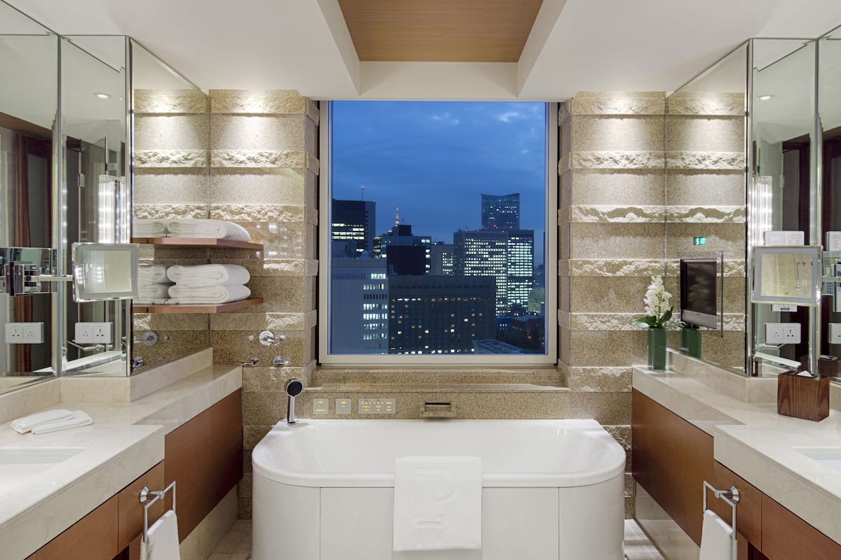 separate bathtub and shower, deep-soaking bathtub, rainfall showerhead