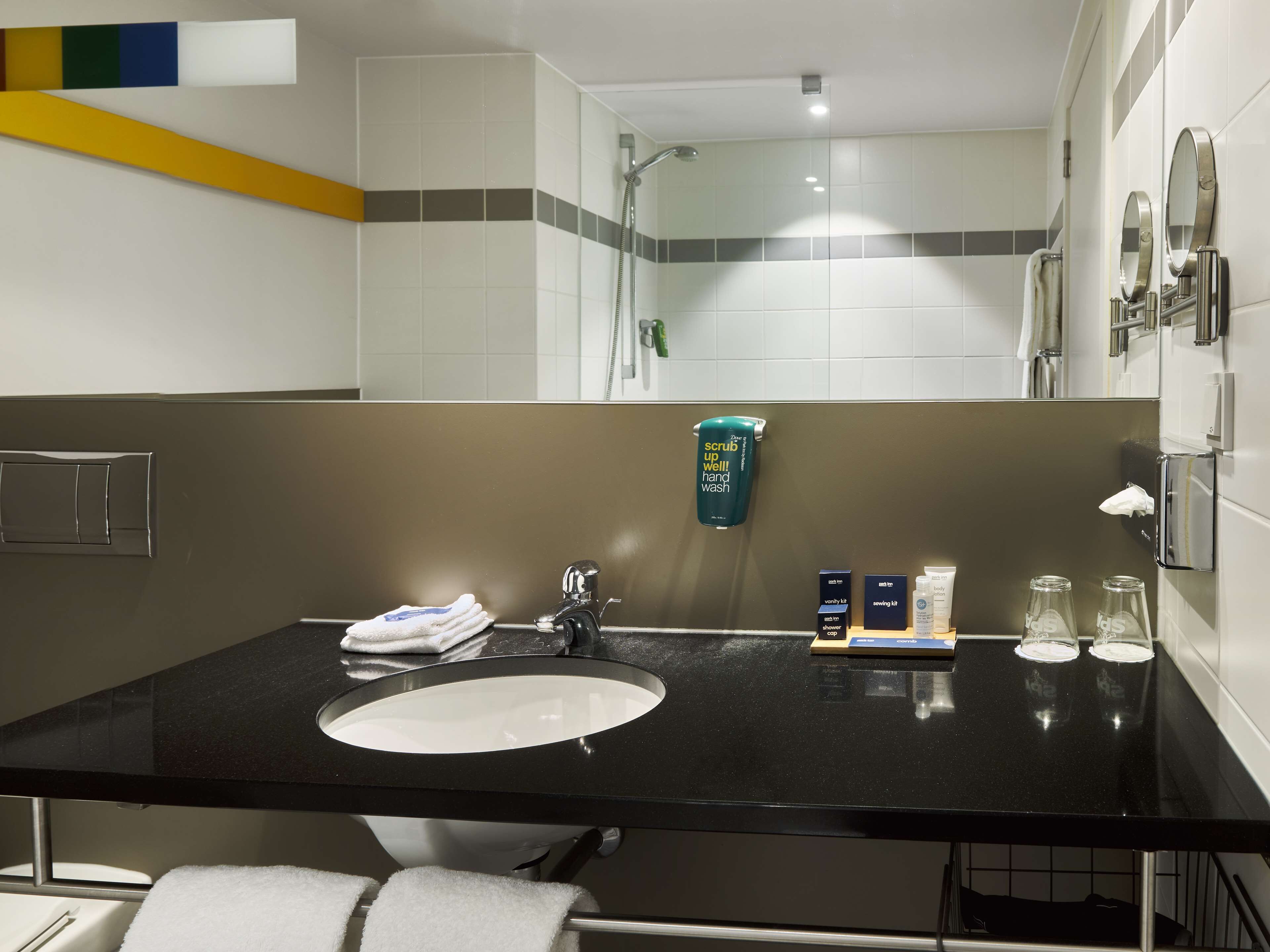 standard room (airport view) | bathroom | hair dryer, towels