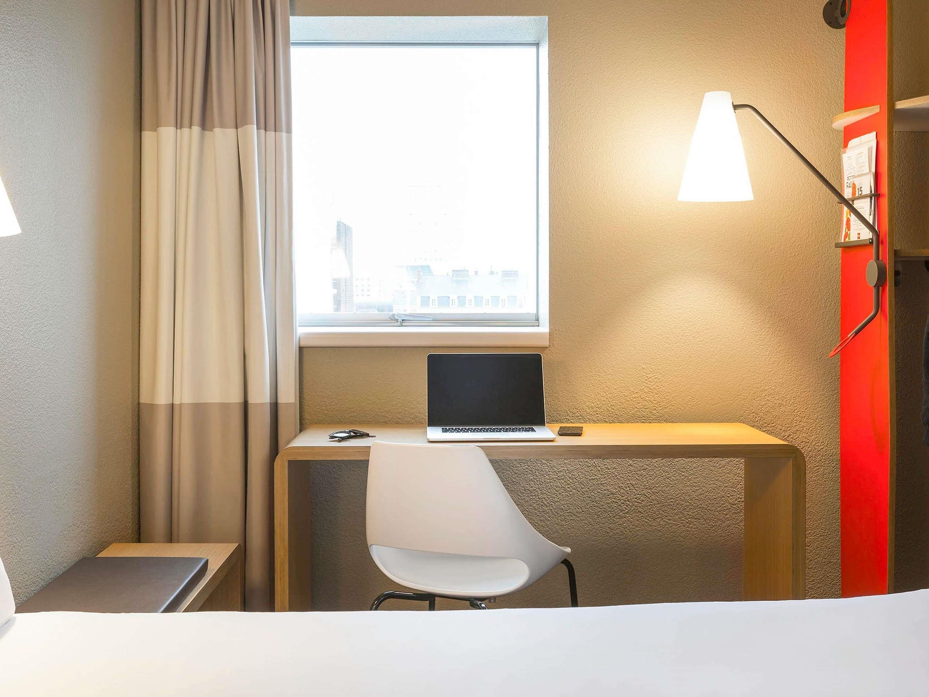 comfort room, 1 double bed | premium bedding, desk, laptop workspace, blackout curtains