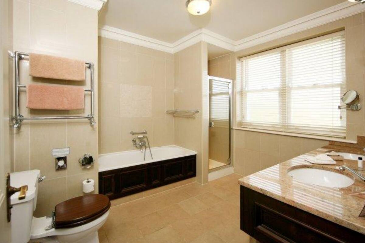 separate bathtub and shower, free toiletries, hair dryer, bathrobes