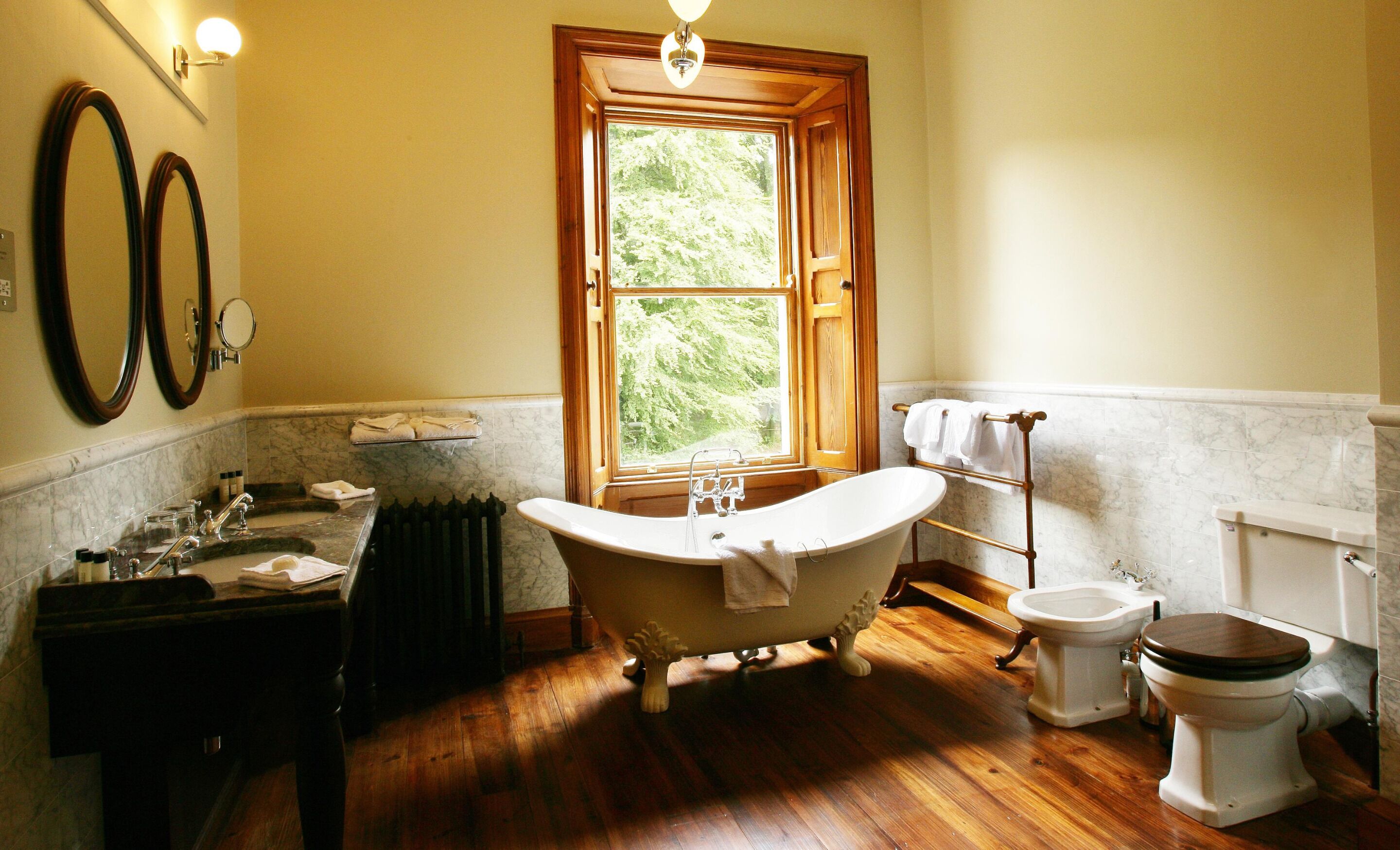 separate bathtub and shower, free toiletries, hair dryer, bathrobes