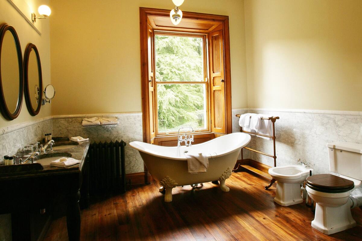 separate bathtub and shower, free toiletries, hair dryer, bathrobes