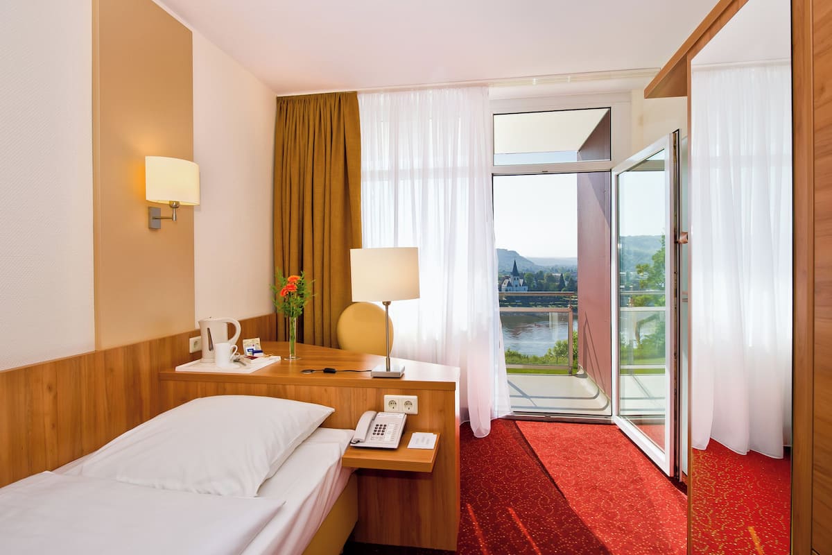 premium bedding, down duvets, desk, blackout curtains