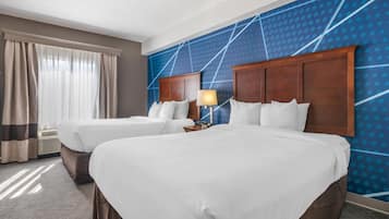Suite, Multiple Beds, Non Smoking (2 Queen Beds with Sofa Bed) | In-room safe, desk, laptop workspace, blackout drapes