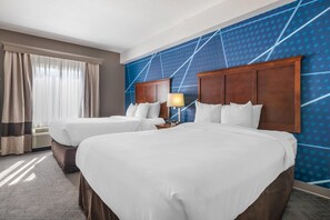 Suite, Multiple Beds, Non Smoking (2 Queen Beds with Sofa Bed) | In-room safe, desk, laptop workspace, blackout drapes