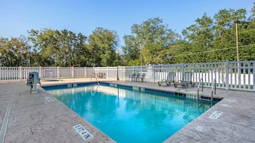 Outdoor pool, open 10:00 AM to 9:00 PM, pool loungers