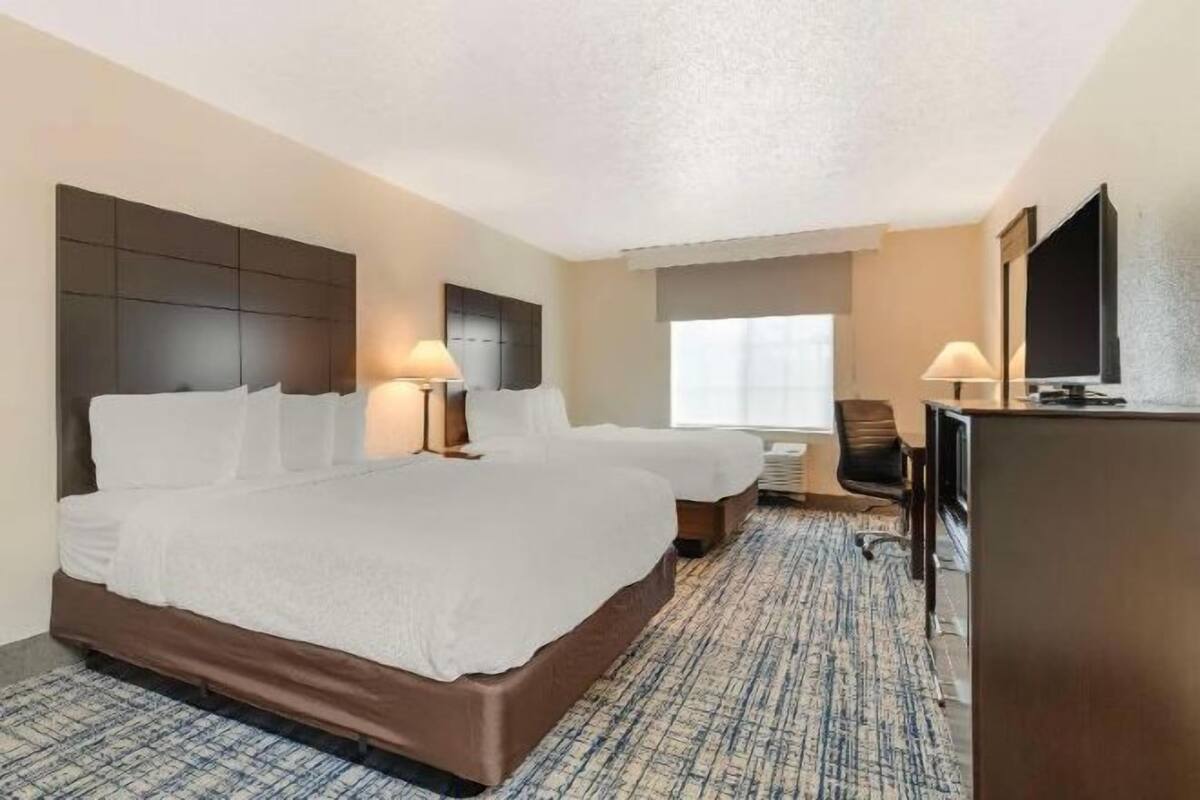 Individually furnished, desk, laptop workspace, iron/ironing board