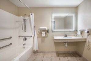 1 King Bed (Mobility Accessible, Non Smoking) | Bathroom | Combined shower/tub, free toiletries, hair dryer, bathrobes