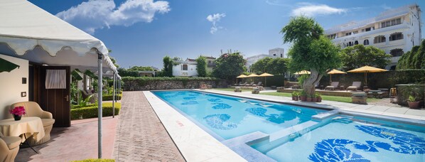 Outdoor pool, pool umbrellas, pool loungers