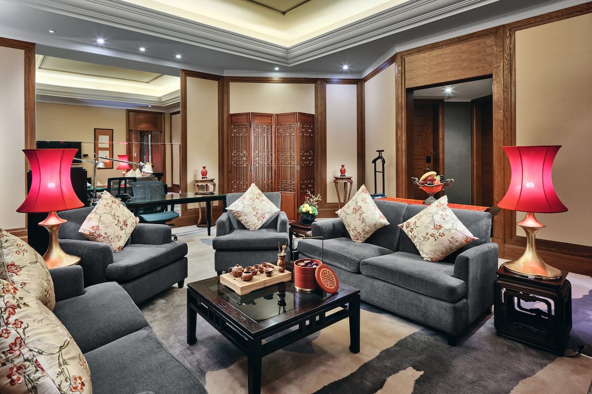 Suite (Chinese Theme) | Living area | 55-inch LCD TV with digital channels, TV, DVD player