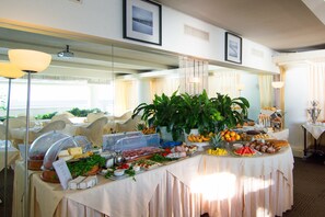 Enjoy a sumptuous spread of fresh fruits, vegetables, and prepared dishes in this well-appointed room.