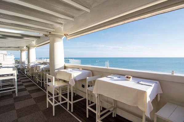 Rooftop bar, alfresco dining, open select days