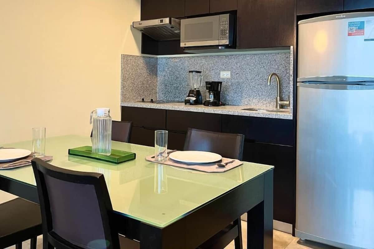 Private kitchen | Microwave, highchair, toaster oven, dining tables