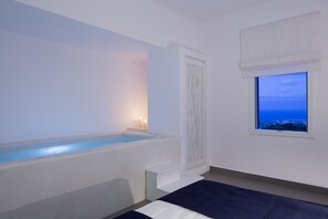 Honeymoon Room, Jetted Tub | Deep soaking bathtub - Loizos Stylish Residences (Santorini)