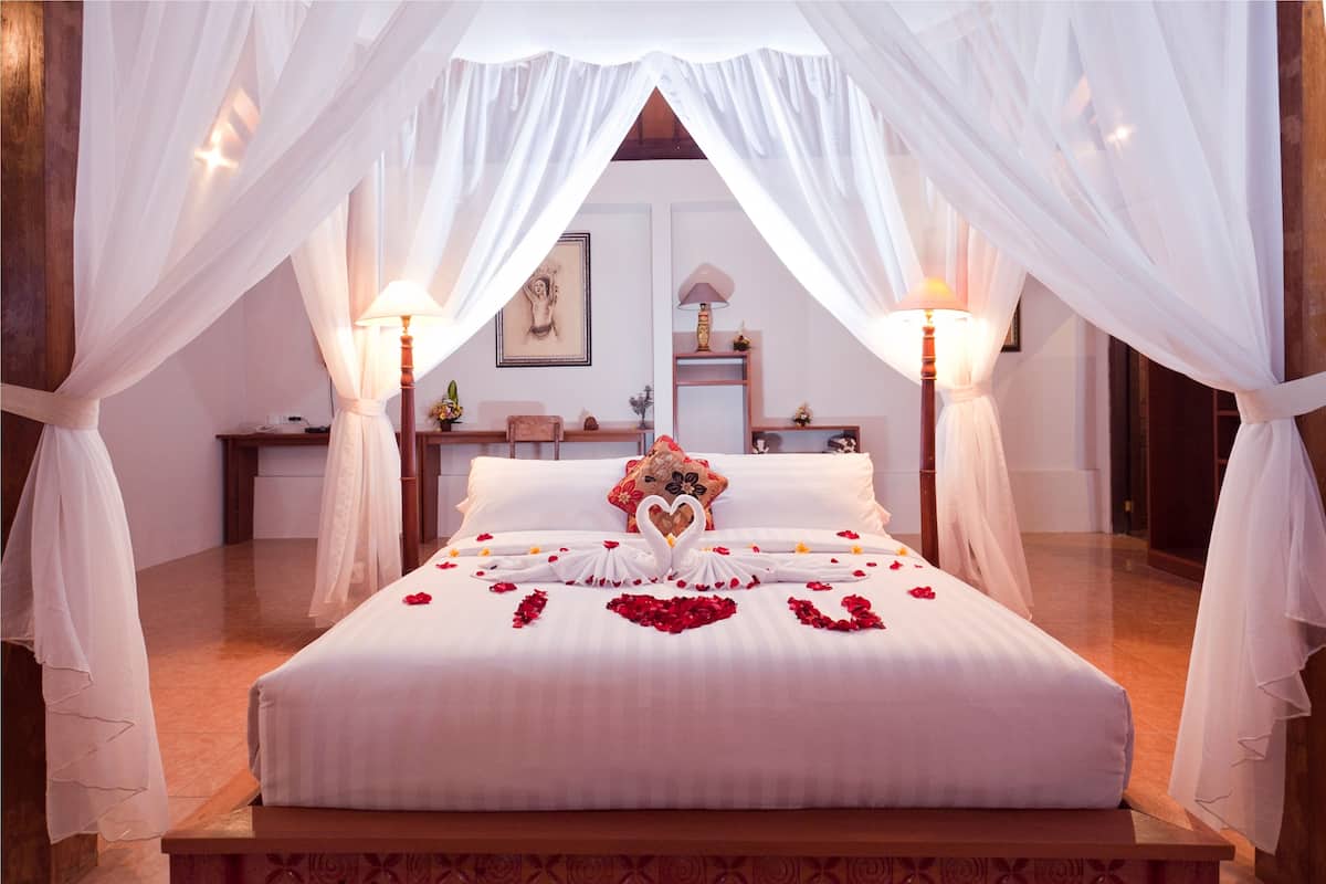 Pillow-top beds, free minibar items, in-room safe, desk