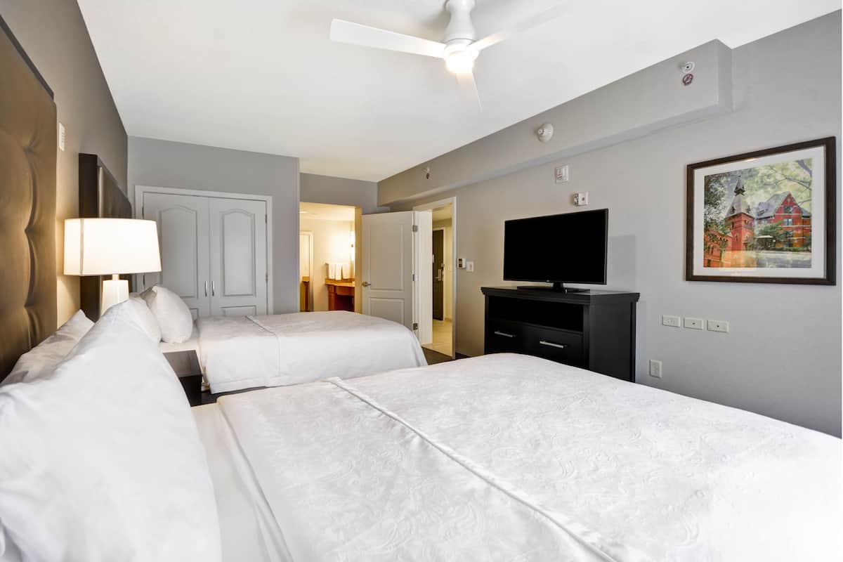 suite, 2 queen beds, accessible, non smoking | premium bedding, iron/ironing board, free cots/infant beds