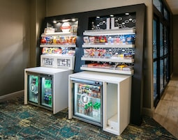A vending machine area with snacks and drinks.