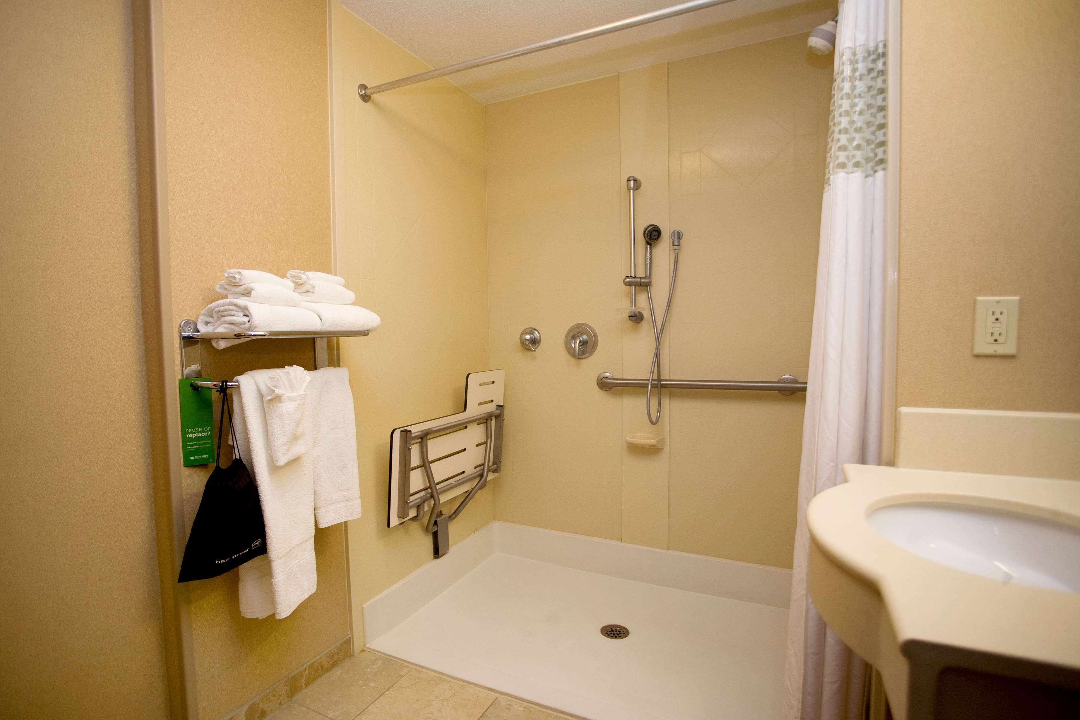 combined shower/bathtub, free toiletries, hair dryer, towels