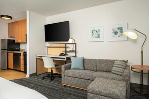 Studio, 1 Queen Bed with Sofa bed | Living area | 32-inch LED TV with satellite channels, Netflix