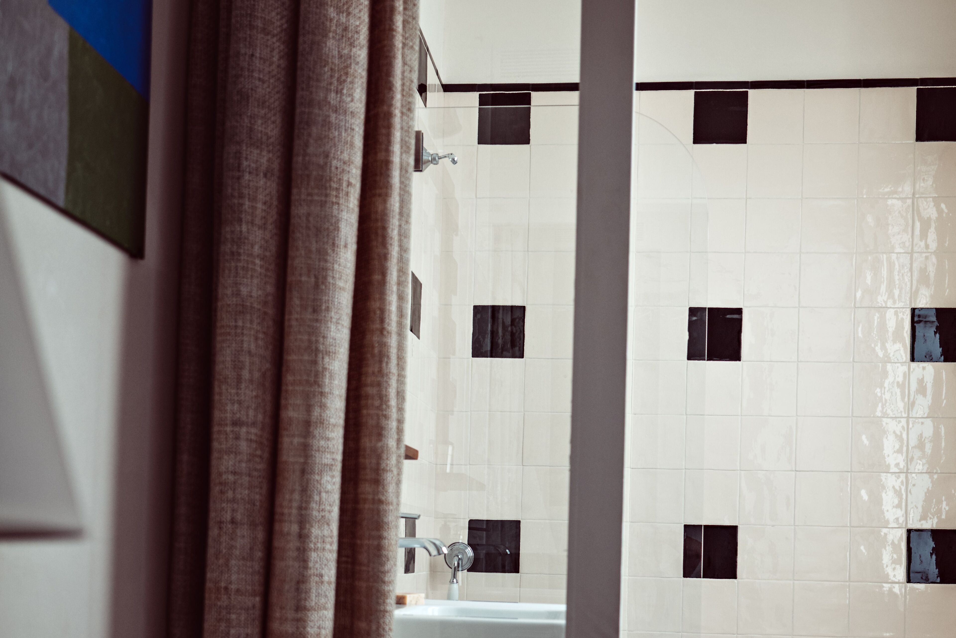 family room | bathroom | combined shower/bathtub, hair dryer, slippers, towels