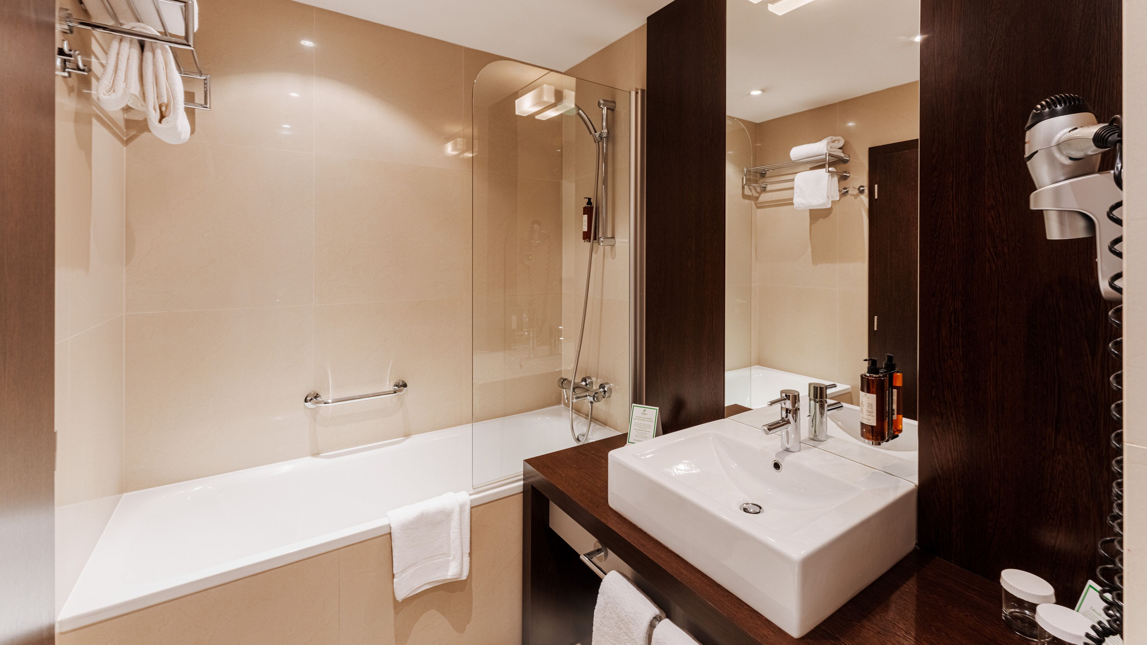 combined shower/bathtub, free toiletries, hair dryer, bathrobes