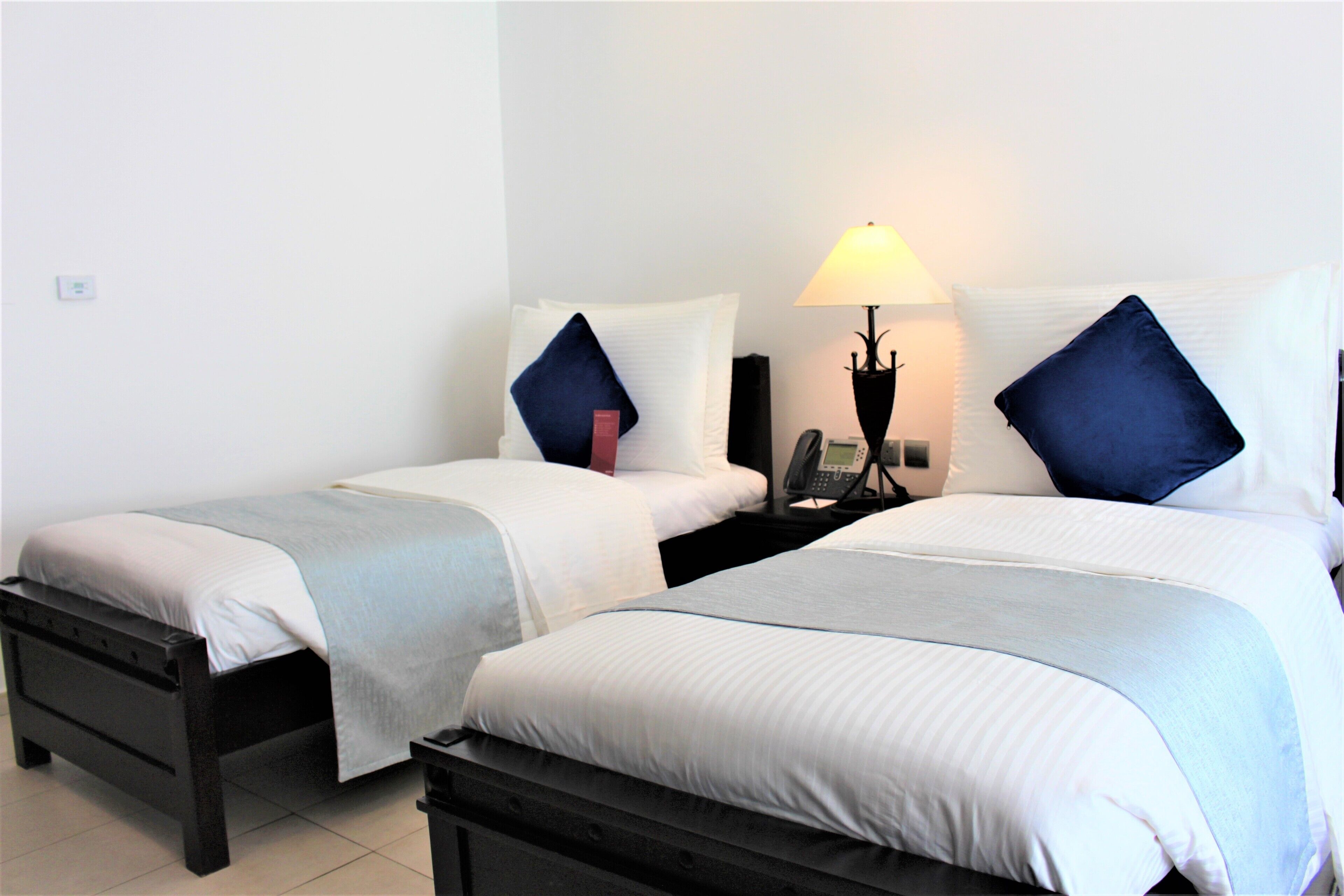 Family Room, Multiple Beds | Minibar, in-room safe, desk, blackout drapes