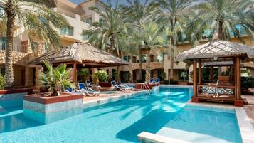 3 piscinas al aire libre, sillones reclinables de piscina