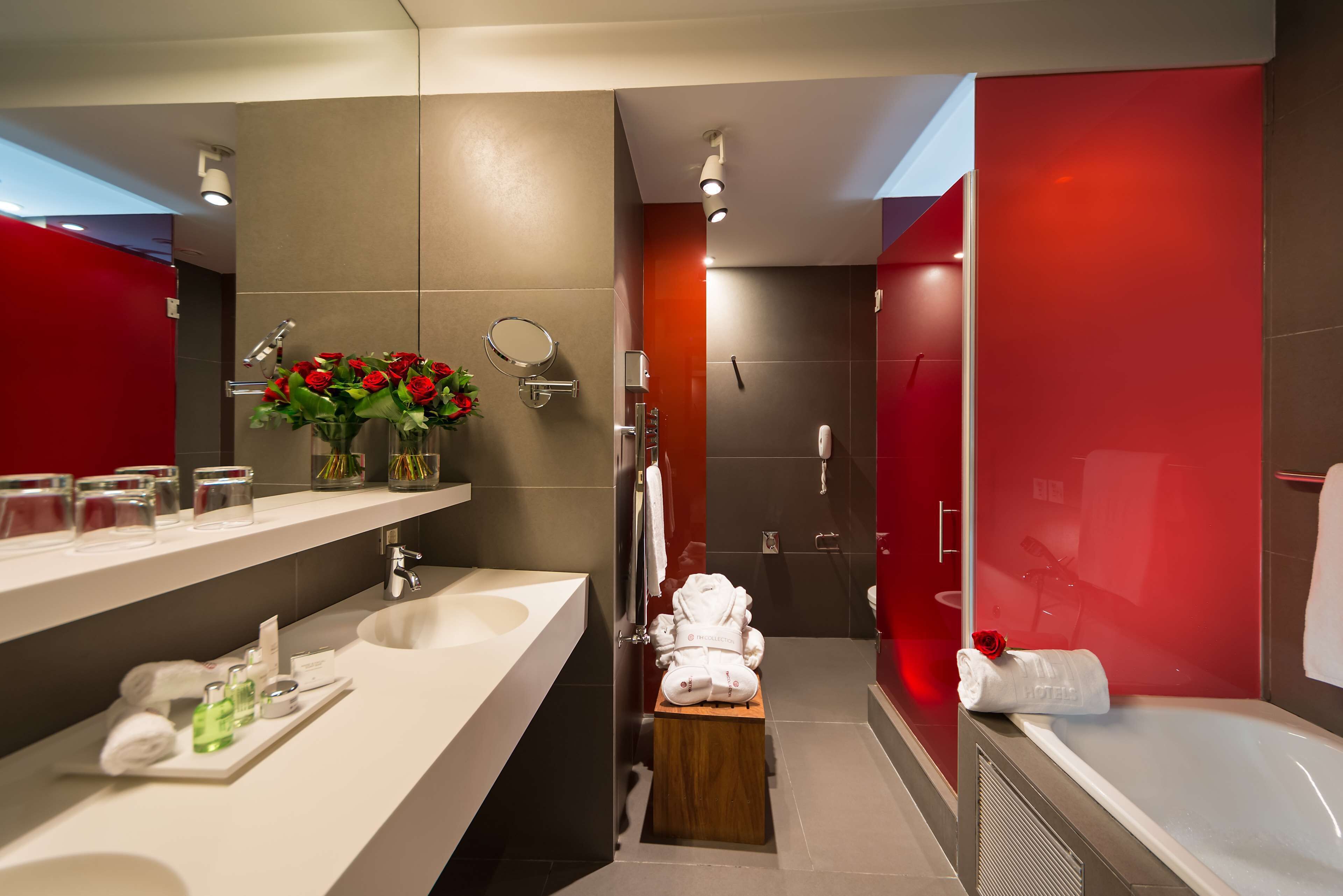 designer toiletries, hair dryer, towels