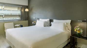 Ropa de cama de alta calidad, minibar, caja fuerte y escritorio