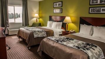 Pillowtop beds, desk, blackout drapes, iron/ironing board