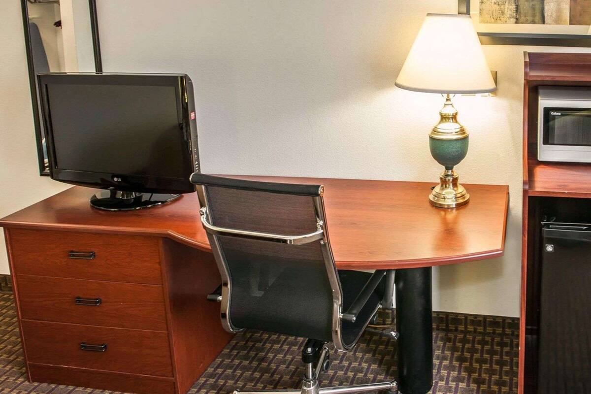 pillow-top beds, desk, blackout curtains, iron/ironing board