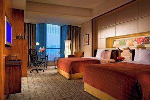 Premium bedding, down duvets, minibar, in-room safe