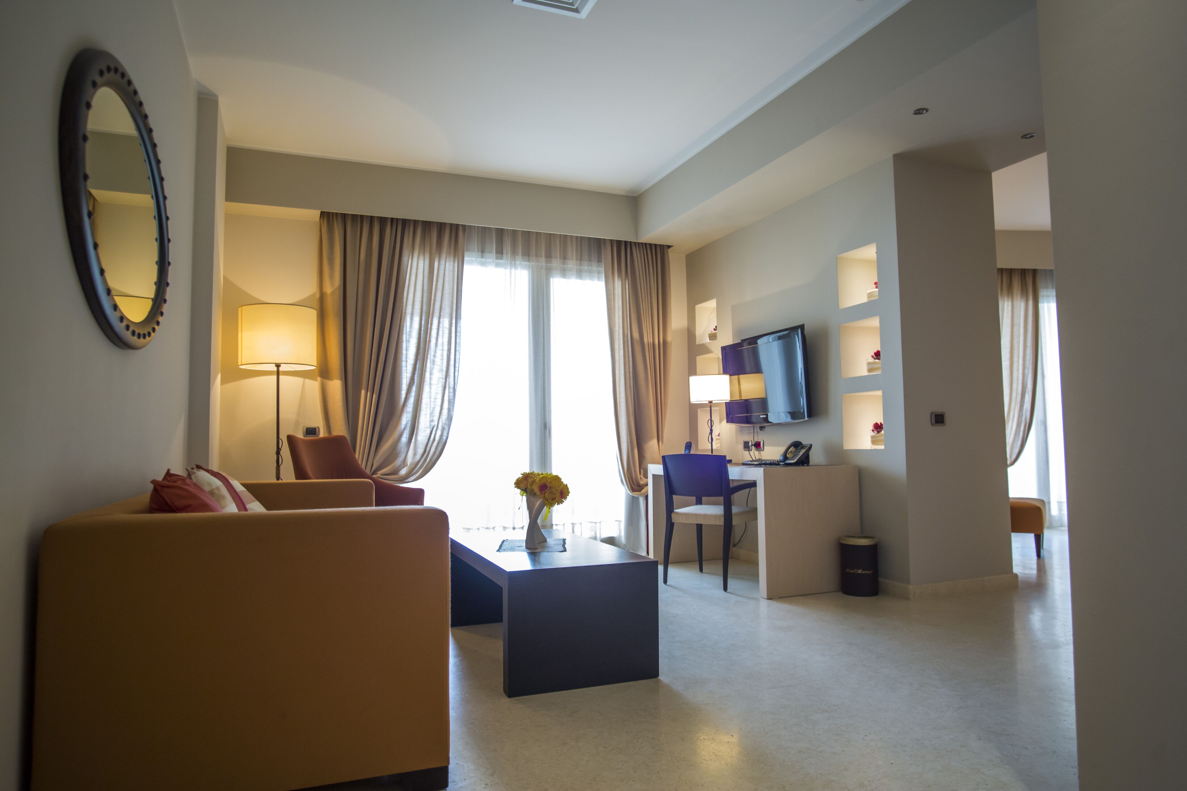 suite | hypo-allergenic bedding, down duvets, minibar, in-room safe