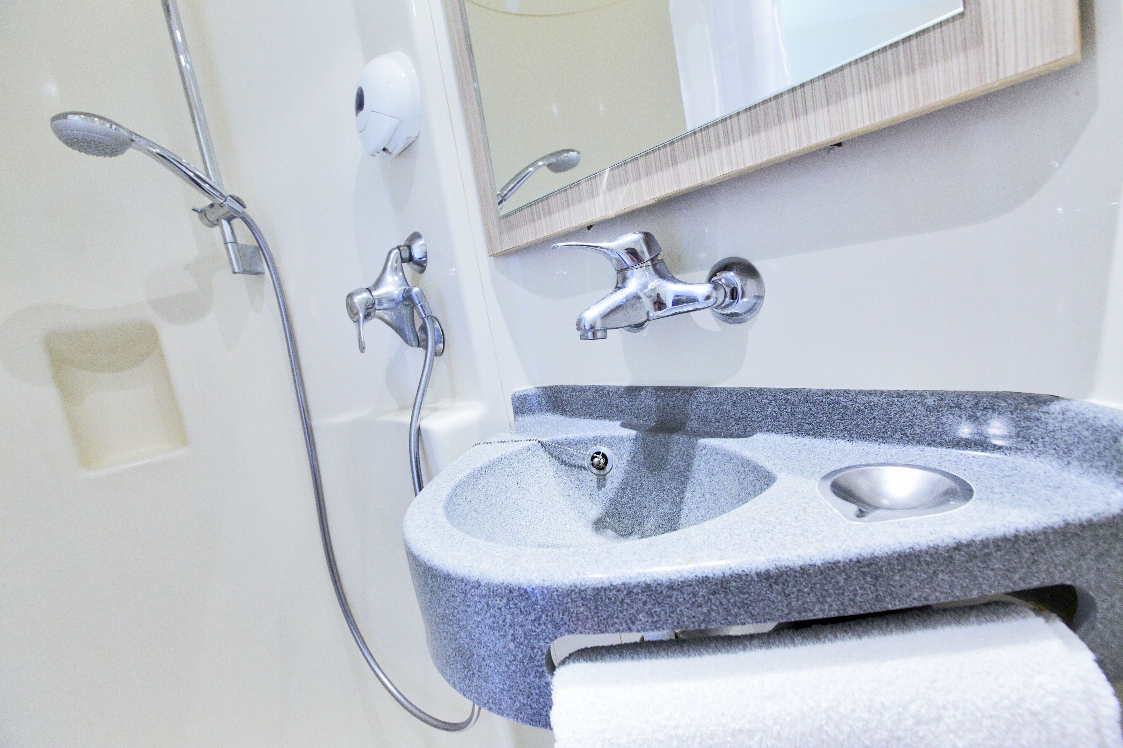 shower, eco-friendly toiletries, towels