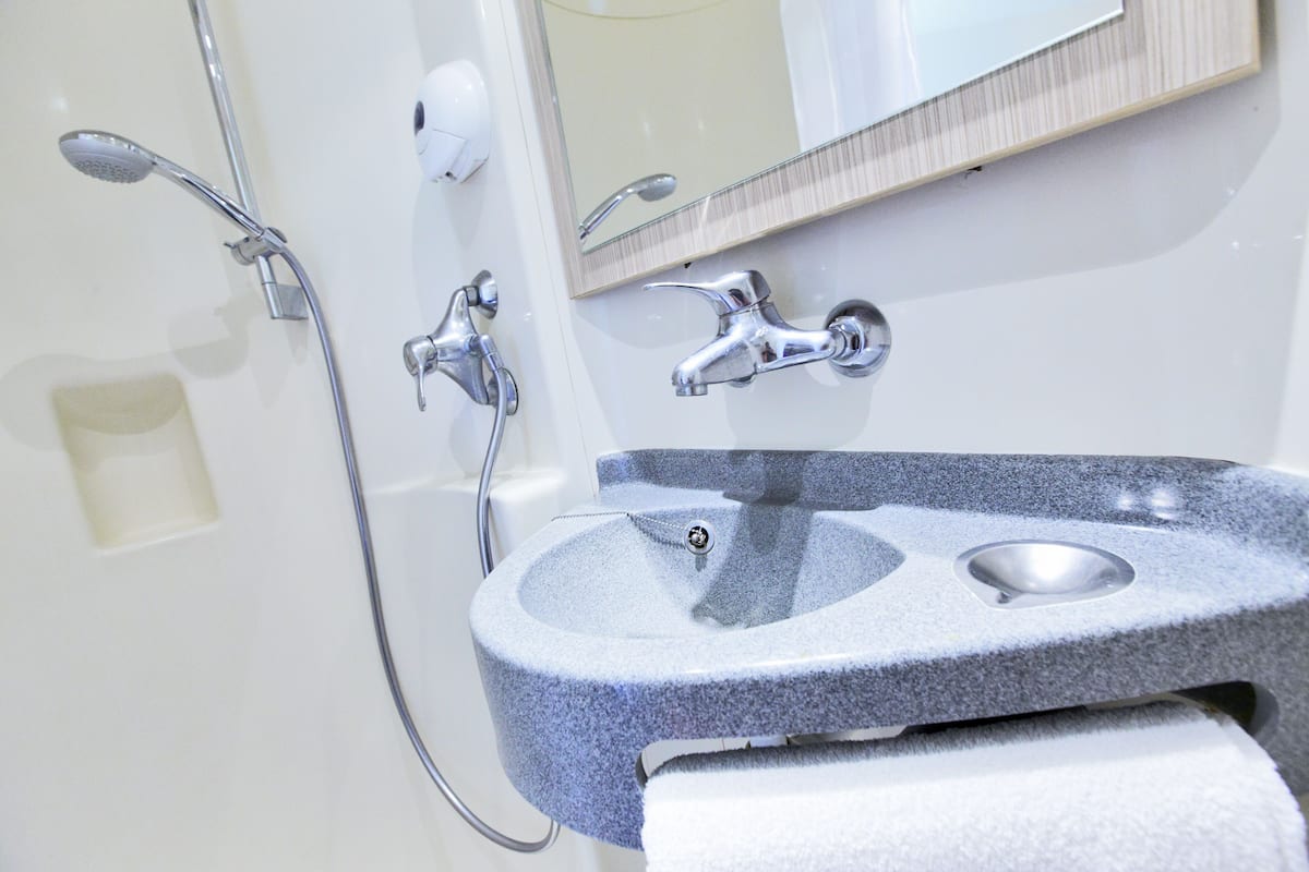 shower, eco-friendly toiletries, towels