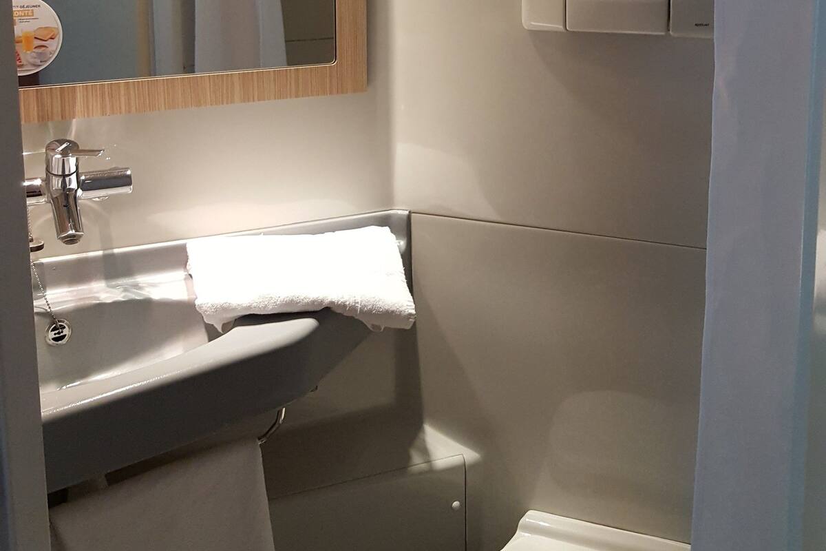 premium bedding, desk, blackout curtains, iron/ironing board