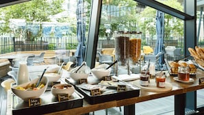 A breakfast buffet with various food items and condiments. - Premiere Classe Lyon Centre - Gare Part Dieu (Lyon)
