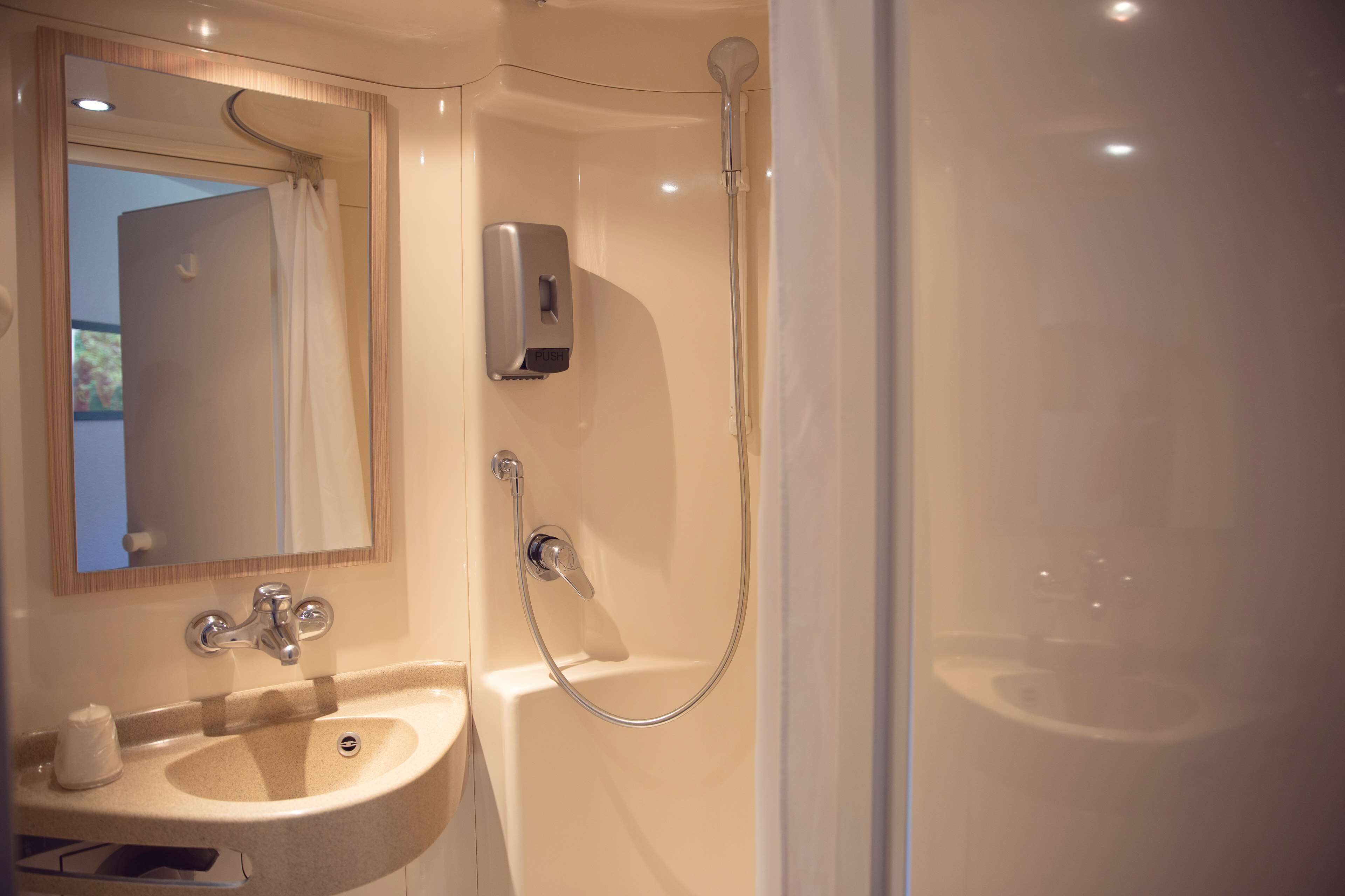 shower, eco-friendly toiletries, towels