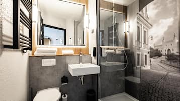Eco-friendly toiletries, hair dryer, towels